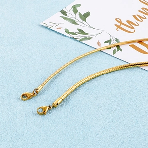 Polished gold snake chain necklace with lobster clasp made of stainless steel for women