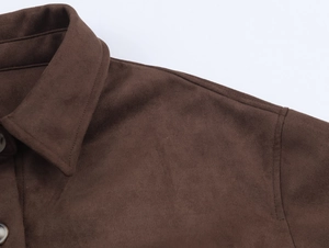 Detail of dark brown faux suede jacket collar showing texture and stitching finish
