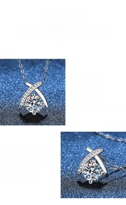 Detail of s925 silver necklace with 1ct moissanite in cross heart setting