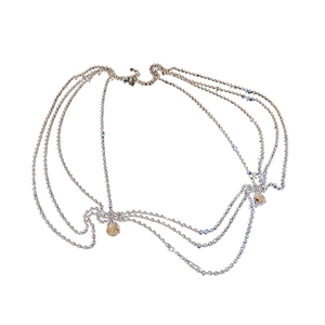 Multilayer crystal body chain with teardrop pendants on a clean white background