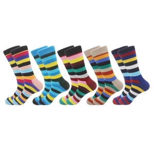 Set of five athletic crew socks with colorful horizontal stripes on a white background