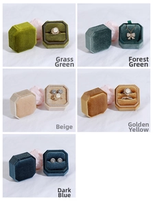 Detailed display of octagonal velvet jewelry boxes in five vintage colors with ring slots