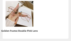 Detail of golden metal frame sunglasses with double pink lenses and diamond decor
