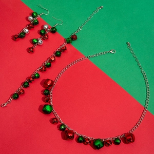 Three-piece Christmas jewelry set featuring red and green bells on earrings and necklace