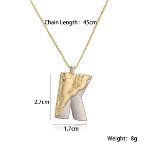 Detail view of two-tone Letter K pendant showing chain length 45cm and 2.7cm size