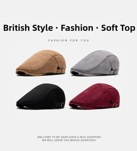Detail of suede newsboy caps with adjustable metal buckles in four classic autumn colors