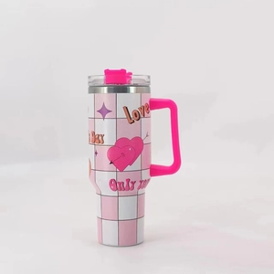 Detail of 40oz stainless steel tumbler with pink and white checkered heart pattern