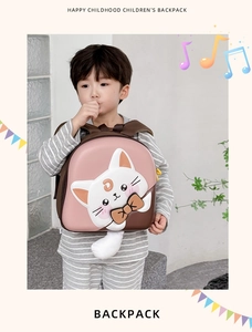 Pink and brown cat backpack for kids featuring a fluffy tail and moon emblem detail