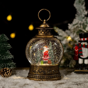 Christmas lantern music box with Santa and tree inside, bronze finish rotating snow globe