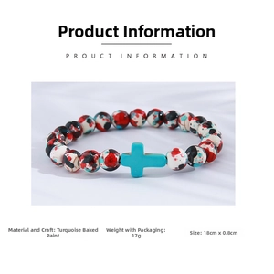 Close-up of turquoise lacquered beads bracelet with a cross charm and 18cm length detail