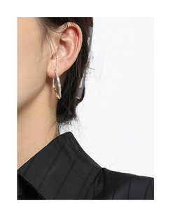 Detailed close-up of S925 sterling silver earrings with irregular textured surface design