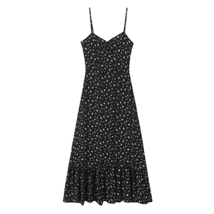 Detail of floral print on black midi dress with spaghetti straps and ruffled hemline