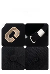 Macro details of black mesh baseball cap with gold C embroidery and metal buckle