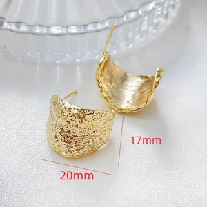 Detail of 14k gold plated irregular square earrings with hammered texture, 17mm by 20mm