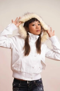 Close-up of white hooded jacket with faux fur trim and button-up front closure