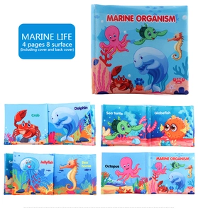 Detail view of marine life soft baby cloth book with colorful sea animal illustrations