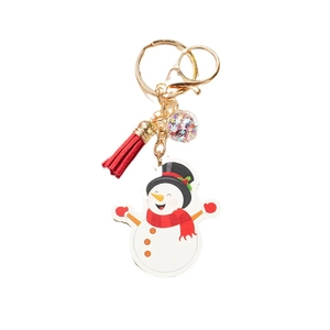 Cute cartoon Christmas snowman keychain with red tassel and colorful glitter charm ball