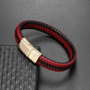 Detail of red and black braided leather bracelet with a gold-plated magnetic metal clasp