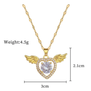 Detailed view of gold wing heart pendant with size measurements and diamond accents