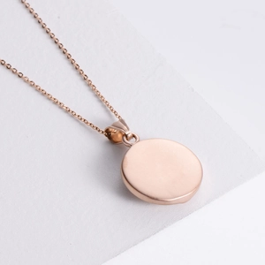Minimalist geometric cobra rose gold stainless steel round pendant necklace on a chain