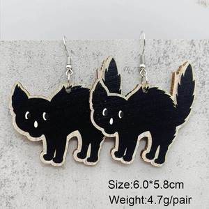 Detail view of black wooden cat earrings for Halloween with size and weight metrics