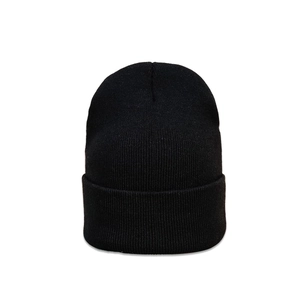 Close-up of black ribbed knit beanie featuring thick cuff and warm wool blend texture