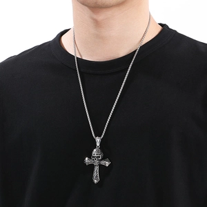 Punk gothic skull cross pendant necklace in silver stainless steel on male model