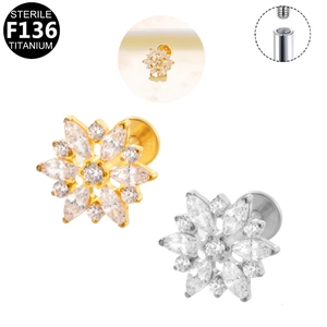 Macro detail of F136 titanium flower piercing stud with zircon and internal thread