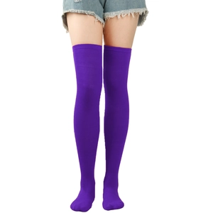 Detail of high-elastic purple over-knee knitted socks shown on legs with clear texture