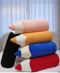 Detail of colorful long pencil plush pillows in soft striped fabric on a white bed