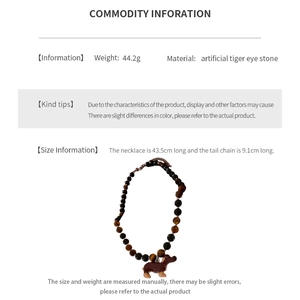 Detail showing dimensions and material specs of the tiger eye stone puppy necklace