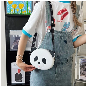 Detailed view of the cute white panda silicone crossbody bag for kids with patterned strap