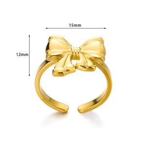 Detail view of adjustable gold bow ring showing dimensions 15mm by 12mm