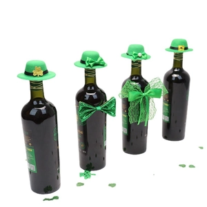 Green St. Patrick's Day wine bottle hats and bowties set with clover patterns