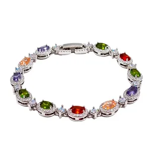 Elegant silver bracelet with multi-color oval gemstones and halo diamond setting