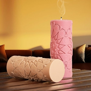 Close-up of mandala and celestial embossed patterns on cylinder candle molds