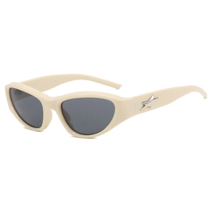Retro Y2K cyberpunk sunglasses with cream frames and metallic star detail in center