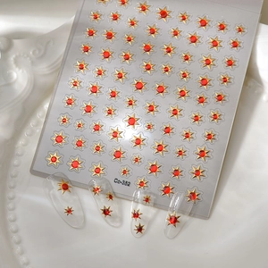 Red 5D embossed nail art stickers with gold star patterns shown on clear display nails