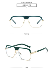 Detail view of retro oversized metal sunglasses with green top frame and gold temples