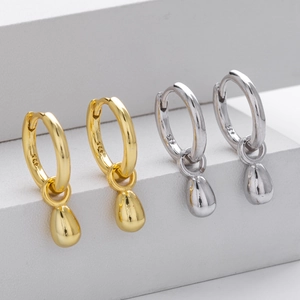 Minimalist S925 sterling silver drop earrings in gold and silver finishes on white display