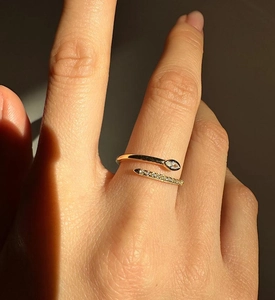 Close-up of golden S925 snake ring featuring marquise zircon and micro-set diamonds