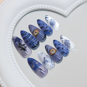 Handmade Cheshire Cat press on nails in dark blue and purple cat-eye shimmer finish