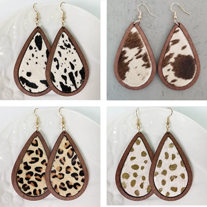Set of four teardrop wood earrings with leopard and cow print faux fur inserts