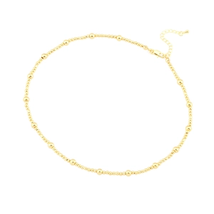 Minimalist French style gold beaded necklace with adjustable lobster clasp on white background