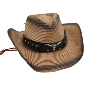 Detailed view of western straw cowboy hat with metallic bull head and leather band