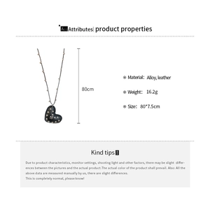Detail showing dimensions of black leather heart pendant necklace with metal studs