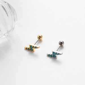 Minimalist stainless steel lightning bolt stud earrings with blue stones in gold and silver