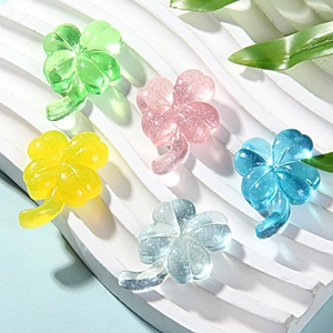 Glittery resin four-leaf clover charms for DIY jewelry and hair accessories in five colors