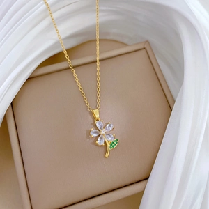 Luxurious titanium steel necklace with green leaf and diamond-studded five-petal flower