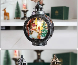 Close-up of vintage LED Christmas lantern featuring a snowman and miniature tree